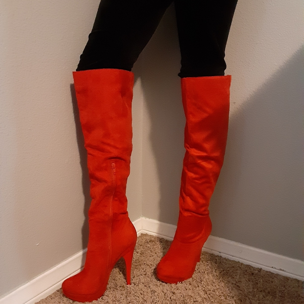 Knee high red boots